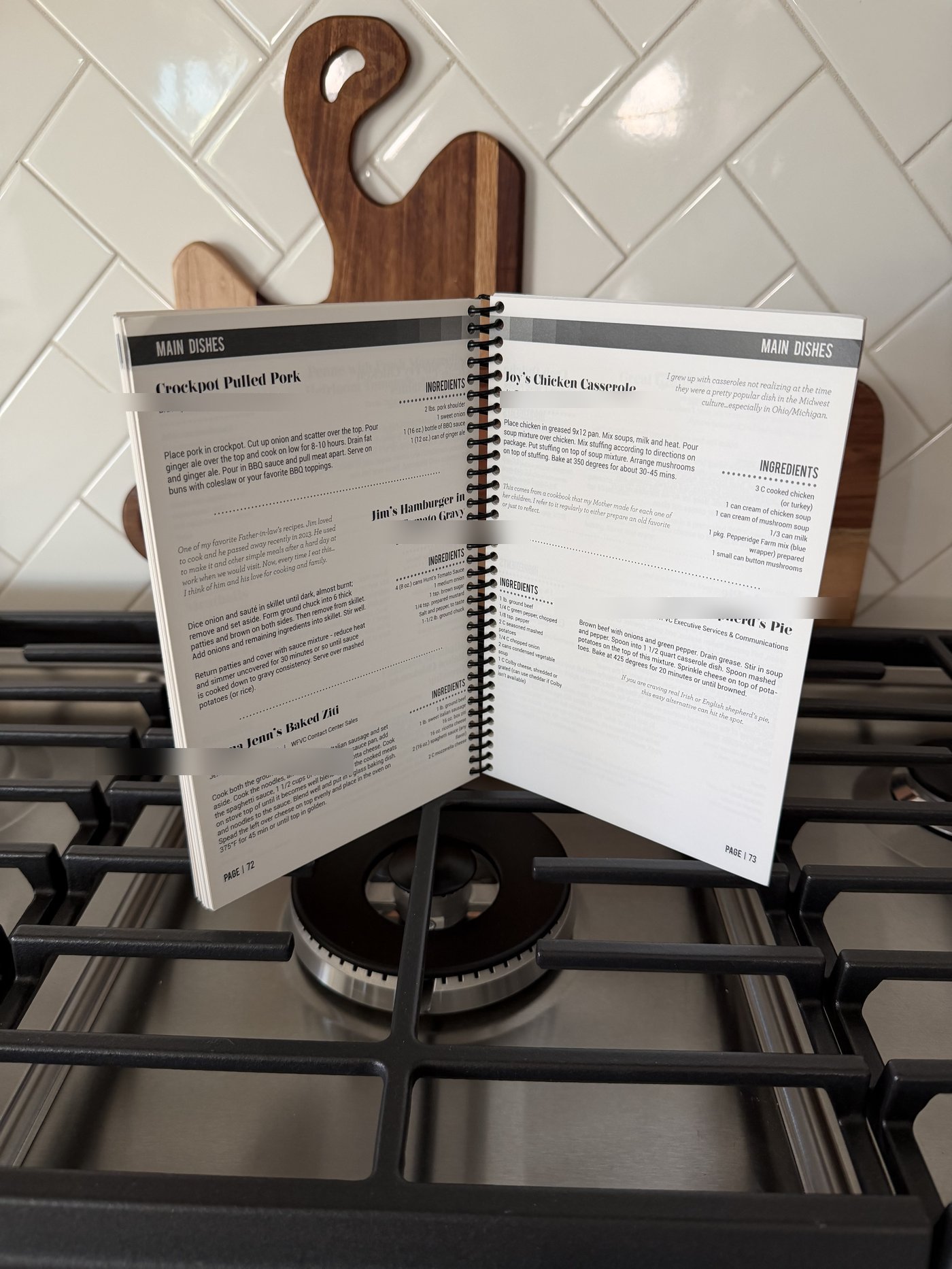 Main Dishes section spread showing recipes like Crockpot Pulled Pork and Joy's Chicken Casserole, each with a personal story from the contributor